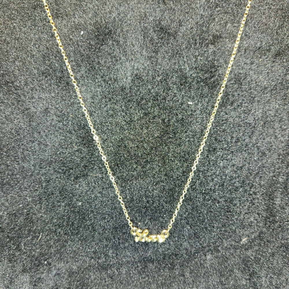 Gold love necklace
